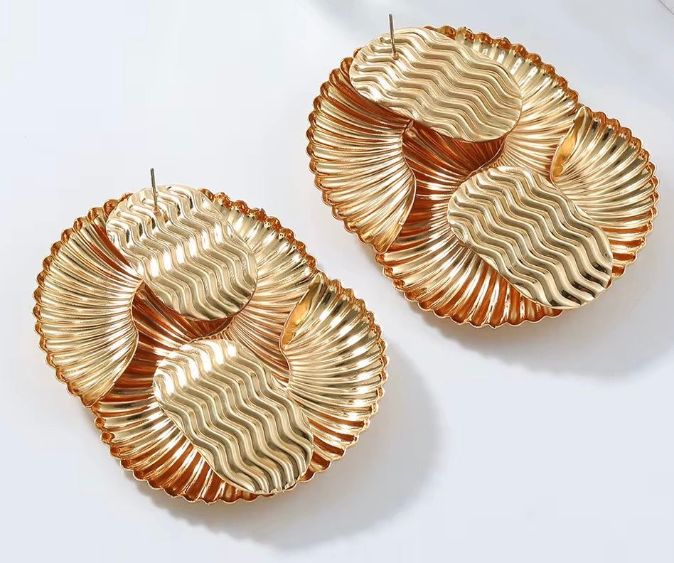Boucles d’oreilles - en spirales texturées – Finition dorée brillante